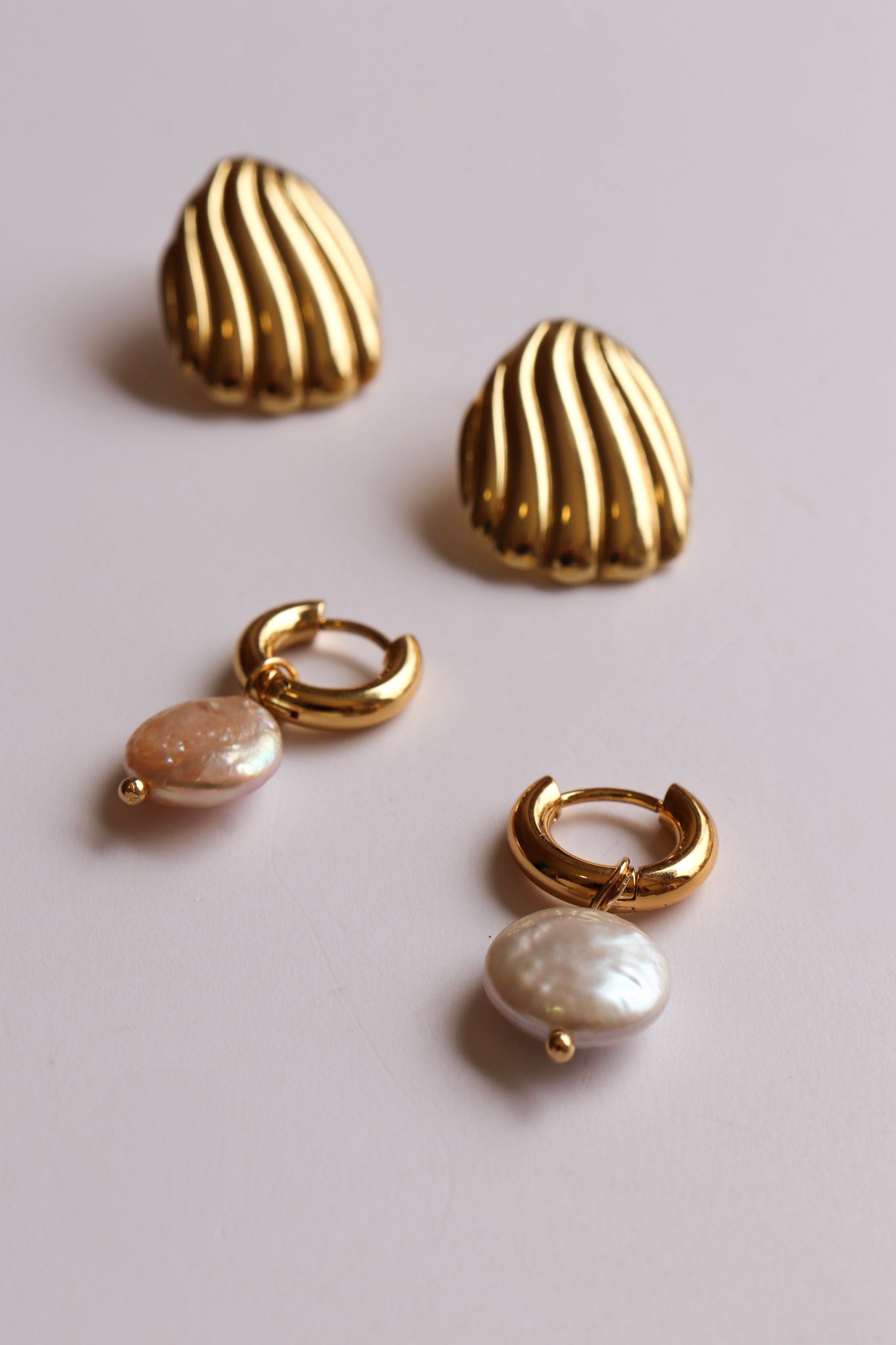 Aretes conchitas