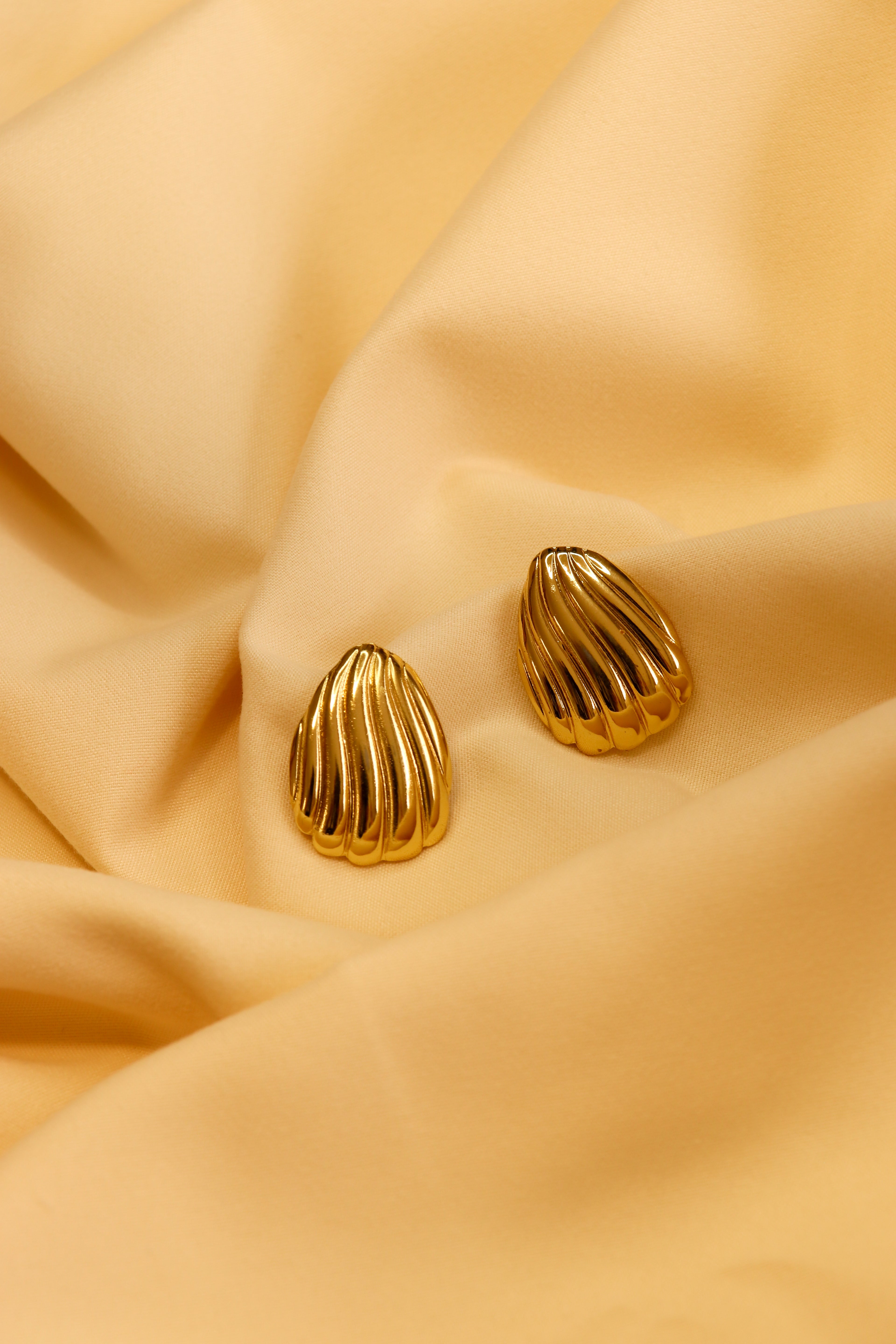 Aretes conchitas